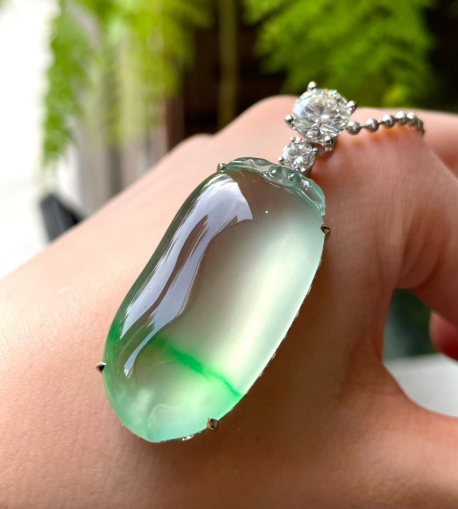 Glassy Floating Yang Green Jadeite Fu Gua Pendant view 1